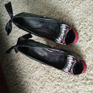 Iron Fist Peep Toe Pumps